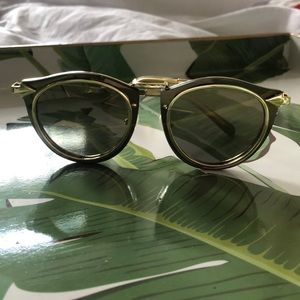 Gold reflective Karen Walker sunnies